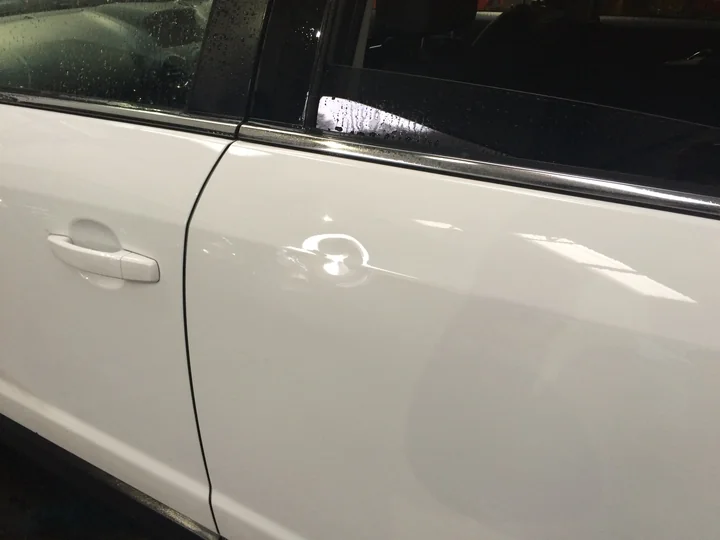 Door panel repair — before