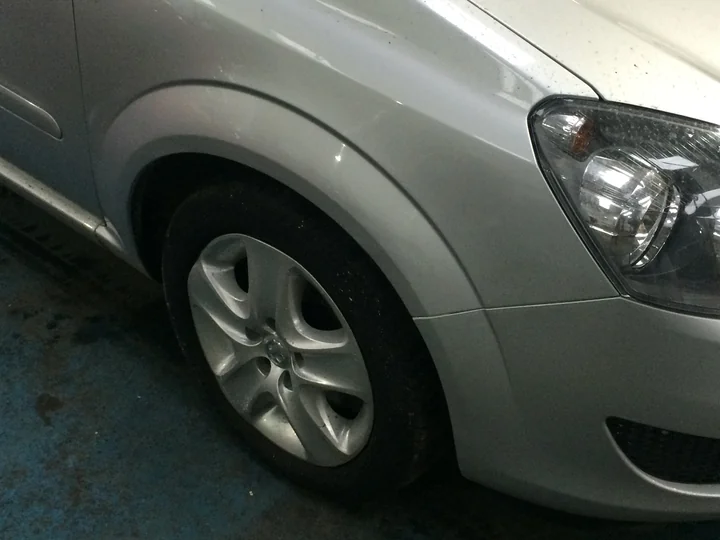 Front wing repair — after