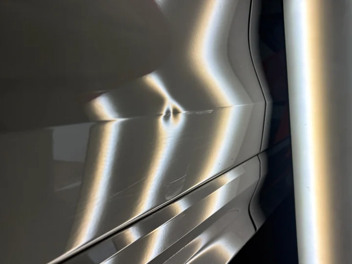 Audi dent repair — before