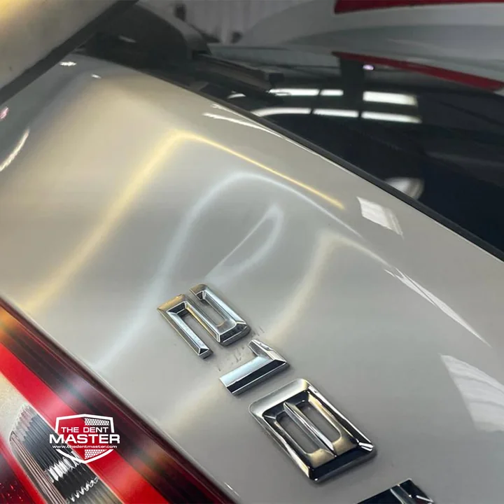 BMW boot lid repair — before