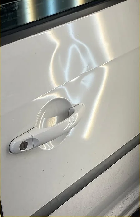 Volkswagen Polo door repair — before
