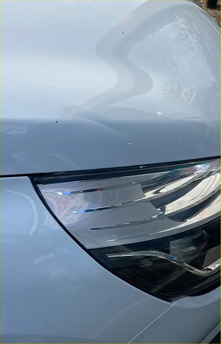 Renault bonnet repair — before